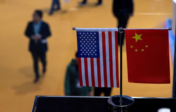 China and US flags at import expo